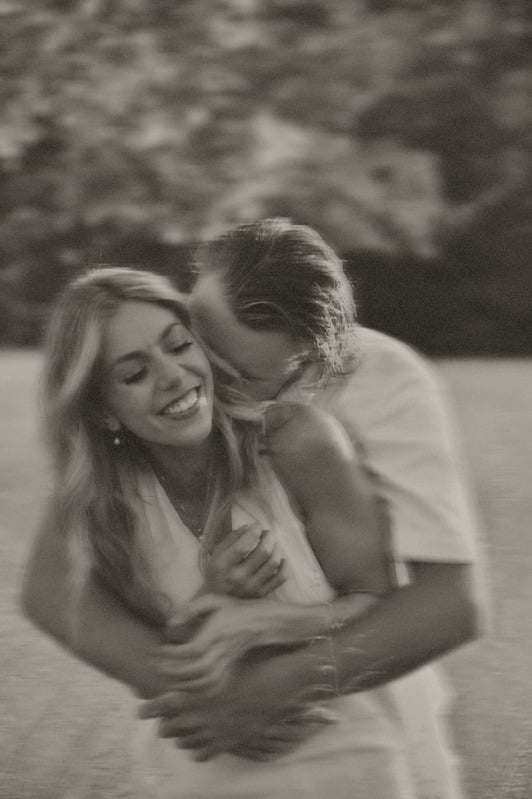 Black and white portrait of a couple close together